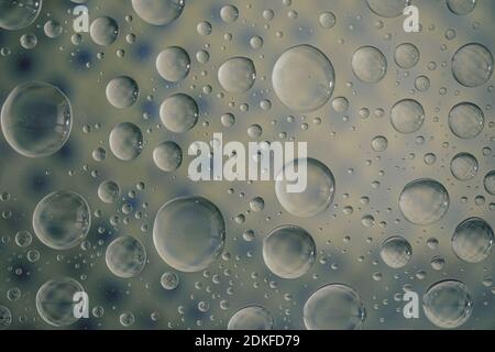 abstract selective focus colorful background with water drops. water bubbles multiple reflections. Stock Photo