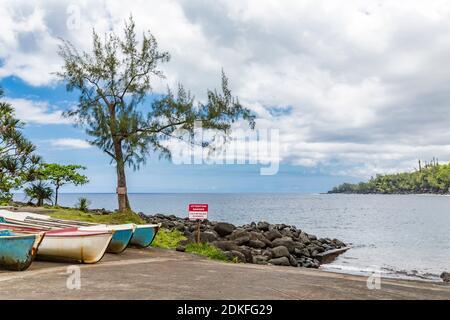 Boats on the beach, destination Anse des Cascades, Piton Sainte-Rose, Reunion Island, France, Africa, Indian Ocean Stock Photo