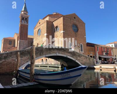 Chioggia, San Giacomo church, cathedral, Filippini bridge, Vena Canal, boat, Veneto region, Italy Stock Photo