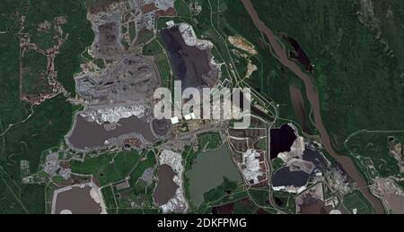 Canadian oil sand production facility from space Stock Photo