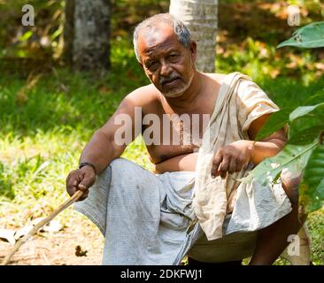 Kerala backwaters, India - Jan 22, 2012: Tanned old Indian fishing with  home-made fishing rod at the hot sunny day in Kerala backwaters, Southern  Indi Stock Photo - Alamy