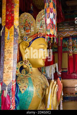 Upper part of the Giant statue of Maitreya Buddha (the largest statue in Ladakh, which occupies two floors of the building) in the Thikse Monastery ne Stock Photo
