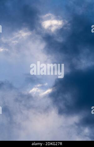 Cloudy sky in romantic blue and white before thunderstorm Stock Photo