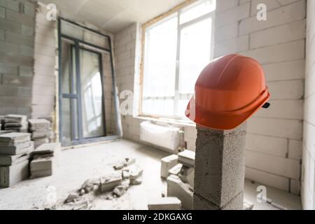 Smashed Wall Building Wall smashed into debris room in apartment ready for renovation with ...