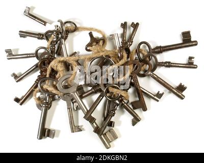Old Keys on a Cord isolated on white Background Stock Photo