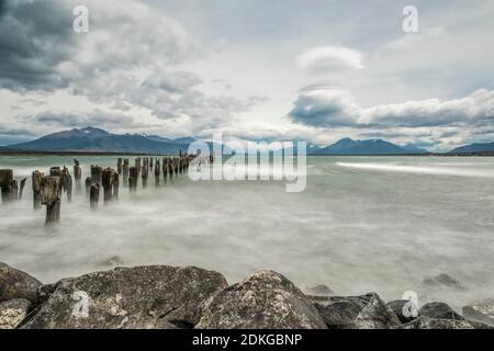 Long-term shot with a view from the shore of the Bay of Last Hope in Puerto Natales, Chile, South America Stock Photo