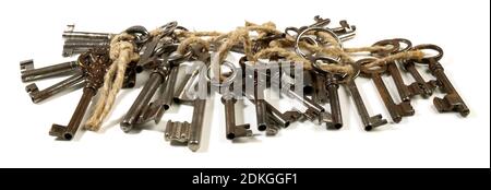 Old Keys on Cord Panorama isolated on white Background Stock Photo