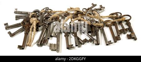 Old Keys on Cord Panorama isolated on white Background Stock Photo