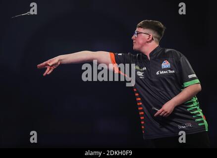 Keane Barry in action during day one of the William Hill World Darts Championship at Alexandra Palace, London. Stock Photo