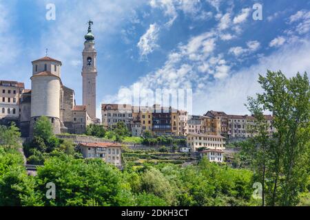 Italy, Veneto, Belluno, Dolomites, the view of the city with the bell tower of the Basilica of San Martino Stock Photo