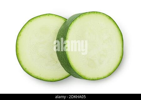 Fresh sliced zucchini isolated on white background with clipping path and full depth of field. Top view. Flat lay. Stock Photo
