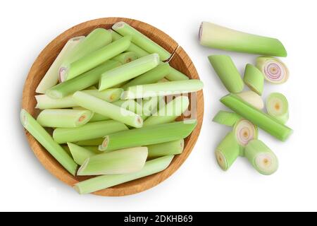 Fresh Lemongrass in wooden bowl isolated on white background with clipping path. Top view. Flat lay.