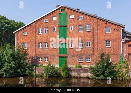 Old storehouse on the Medem River, North Sea Spa Otterndorf, Lower Saxony, Germany Stock Photo