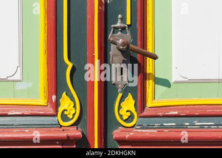 Doorknob on old decorated door on a half-timbered house, North Sea Spa Otterndorf, Lower Saxony, Germany Stock Photo