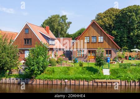 Residential houses on the Medem River, North Sea Spa Otterndorf, Lower Saxony, Germany Stock Photo