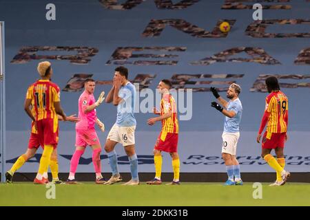 Manchester, UK. 16th Dec, 2020. Manchester City's Sergio Aguero (2nd R) reacts after a missed opportunity during the Premier League football match between Manchester City and West Bromwich Albion at the Etihad Stadium in Manchester, Britain, on Dec. 15, 2020. Credit: Xinhua/Alamy Live News Stock Photo
