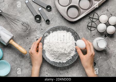 Woman preparing bakery on table, top view Stock Photo