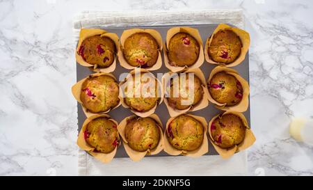 Flat lay. Step by step. Cooling freshly baked cranberry muffins. Stock Photo