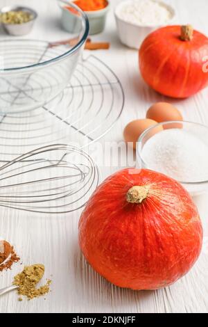 Ingredients for preparing pumpkin pie on table Stock Photo