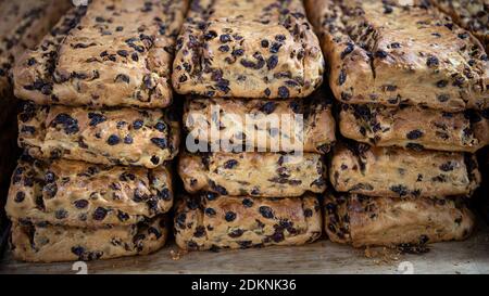 Bremen, Germany. 10th Dec, 2020. Freshly baked Bremen Klaben lie in the bakery of the Knigge confectionery. (to dpa "Wintertime is Klabentime: Bremen pastries are shipped worldwide") Credit: Sina Schuldt/dpa/Ģ����ý Live News Stock Photo