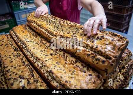 Bremen, Germany. 10th Dec, 2020. Freshly baked Bremen Klaben lie in the bakery of the Knigge confectionery. (to dpa "Wintertime is Klabentime: Bremen pastries are shipped worldwide") Credit: Sina Schuldt/dpa/Ģ����ý Live News Stock Photo
