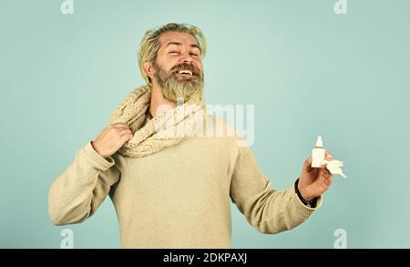 happy hipster presenting best remedy. Nasal drops plastic bottle. pandemic concept. man treat runny nose with nasal spray. free your stuffy nose. no addiction to medicals. coronavirus from china. Stock Photo