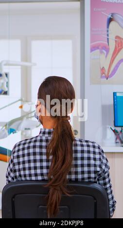 Nurse talking to patient wearing PPE Stock Photo - Alamy