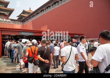 Queue for ticket and security check inside  Tiananmen Gate of Heavenly Peace to enter Forbidden City in Beijing Stock Photo