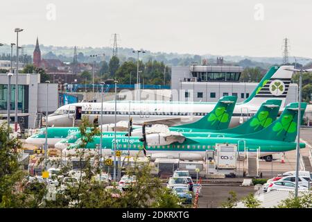 Aer Lingus Airbus A320 in heritage livery with Aer Lingus ATR72-600's at Belfast City Airport, BHD, Northern Ireland Stock Photo