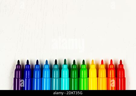 Bright red markers on white background, top view. School stationery Stock  Photo - Alamy