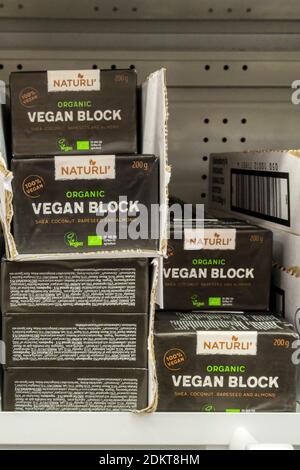 Naturli organic vegan block on sale in a supermarket.  A vegan alternative to butter. Stock Photo