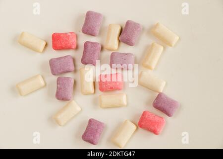 Different chewing gums on the white background, colorful Stock Photo