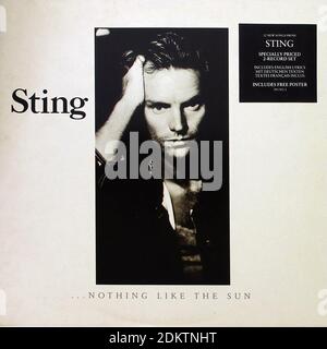 STING NOTHING LIKE THE SUN + POSTER 12  2LP  - Vintage Vinyl Record Cover Stock Photo