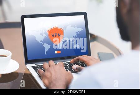 Black Man Using Laptop Computer With VPN Virtual Private Network Connection, Collage Stock Photo