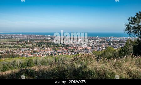 Eastbourne, East Sussex, England. An elevated view of the popular English south coast resort town with an elevated view from the South Downs. Stock Photo
