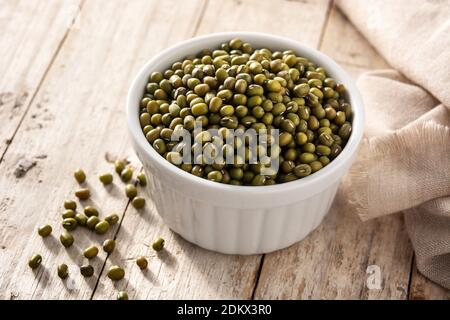Green soy beans on wooden table. Stock Photo