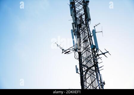 Telecommunication mast TV antennas wireless technology with 5g Stock Photo