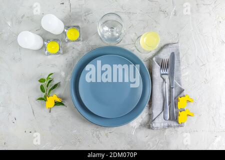 Ultimate Gray and Illuminating colors aesthetic elegant fine Easter events table place setting overhead. Top view creative composition flat lay. Stock Photo