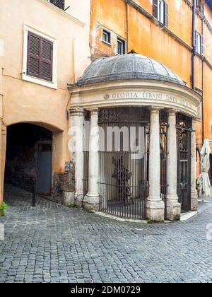 Tempietto del Carmelo (Temple of Carmel) raised in 1759 by a family of grocers to protect an image dedicated to S. Maria del Carmine is situated in the Jewish ghetto  - Rome, Italy Stock Photo