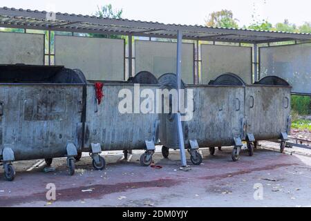 Garbage containers near apartment building in district garbage bins to ...