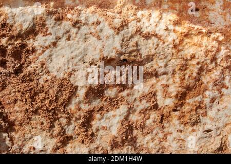 Textured stone, sandstone, limestone surface. Close image. Stone, natural abstract texture for backgrounds. Close up. architecture. Stock Photo