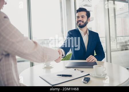 Portrait of his he her she two nice attractive stylish cheerful people meeting guy welcoming new sales manager shaking hands career start-up project Stock Photo