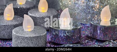LED candles set with sparkling decoration close up Stock Photo