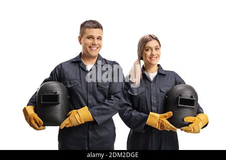 Team of a male and female welders in uniforms smiling at camera isolated on white background Stock Photo