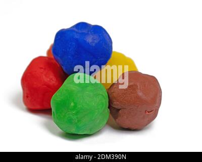 Colorful plasticine against a white background Stock Photo