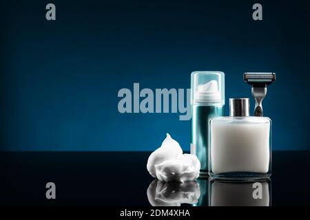 Set of shaving tools for men. with copy space. Dark blue background. Stock Photo