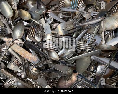 A texture pattern background of antique silverware. Stock Photo