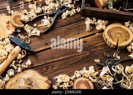 Do it Yourself wood. Woodworking workshop. DIY. Wood shavings and carpentry tools. Copy Space Stock Photo