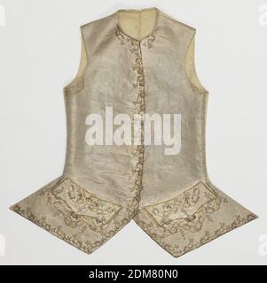 Waistcoat, Medium: silk, metal Technique: embroidered with metal-wrapped silk, sequins (pailletes) and coils of wire of two types; on a foundation of plain weave silk with continuous supplementary weft of metal-wrapped silk, Gentleman's waistcoat in off-white silk with metallic, embroidered lightly on the front and lower edges and pocket area with gold thread, colored metallic sequins and coils of wire., France, 1765–75, costume & accessories, Waistcoat Stock Photo