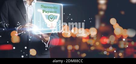Businessman using table in online shopping, banking and online payment. Successful online shopping concept. Mixed media Stock Photo